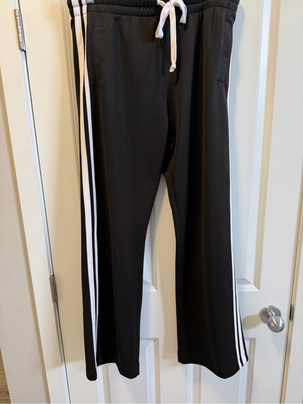 Stone immaculate, black track pants